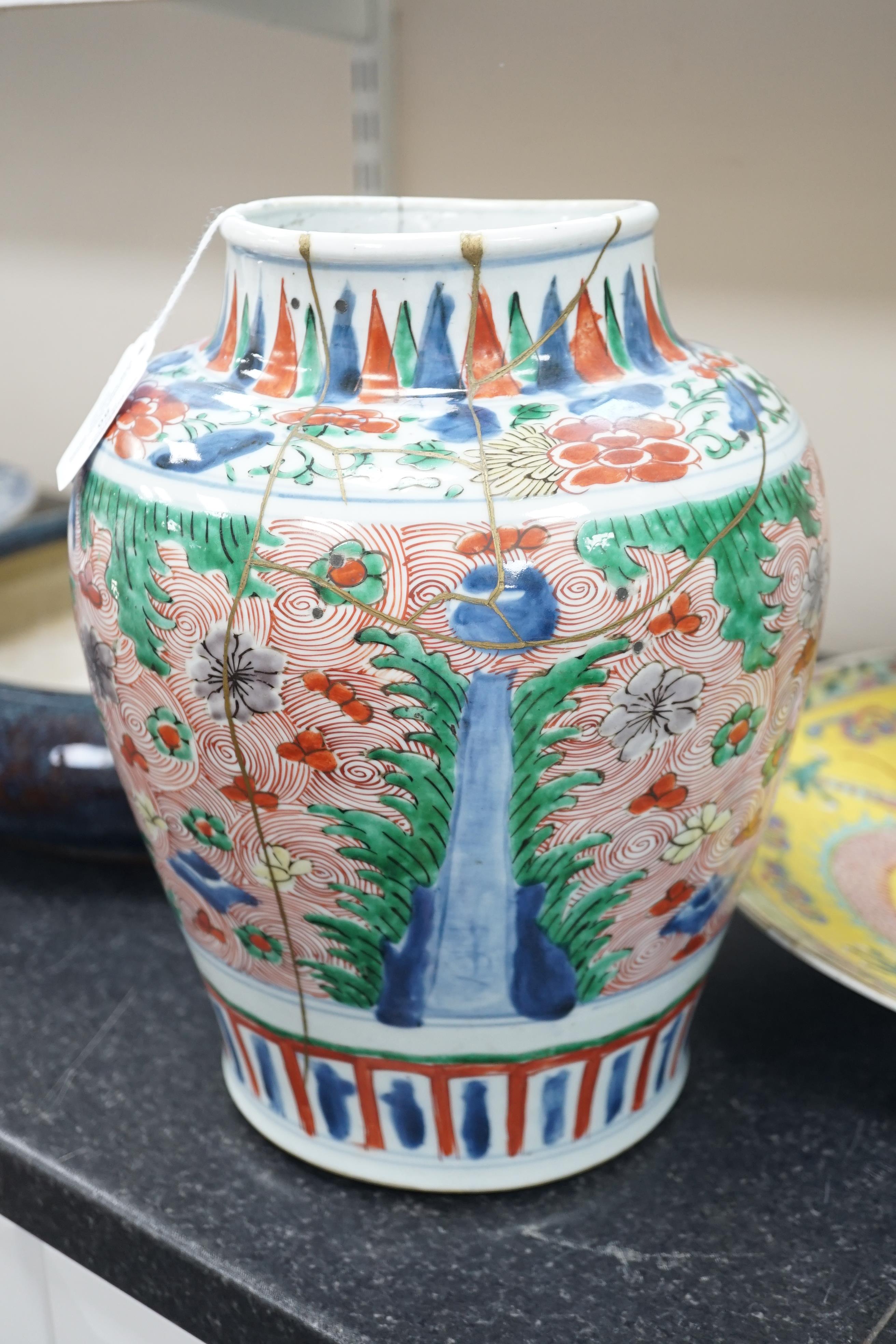 A Chinese wucai ovoid vase and cover, Transitional, Shunzhi period, broken with kintsugi style repair